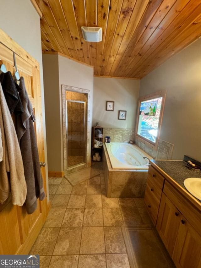 bathroom with tile patterned floors, wood ceiling, vanity, and independent shower and bath