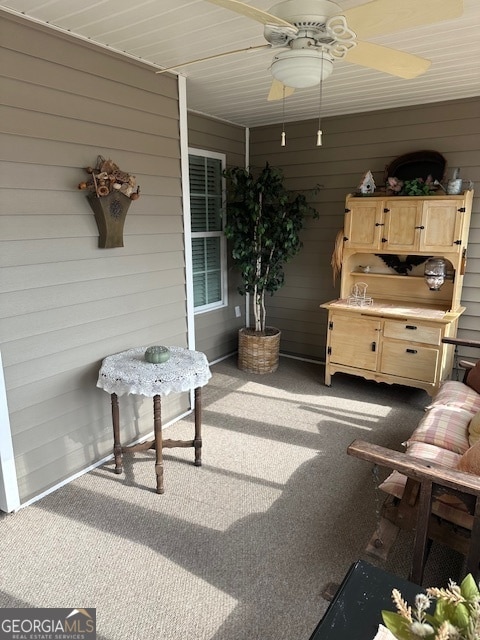 view of patio featuring ceiling fan