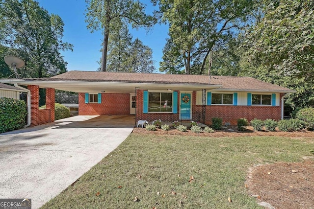 single story home featuring a front lawn and a carport