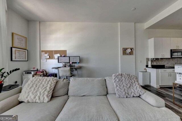 living room with wood-type flooring