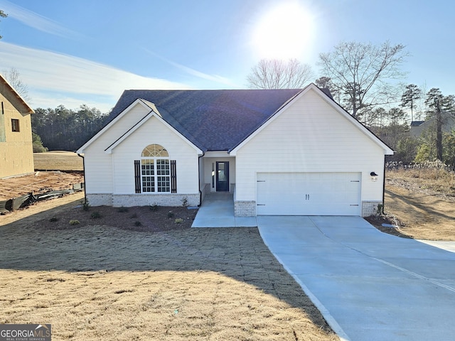 single story home with a garage