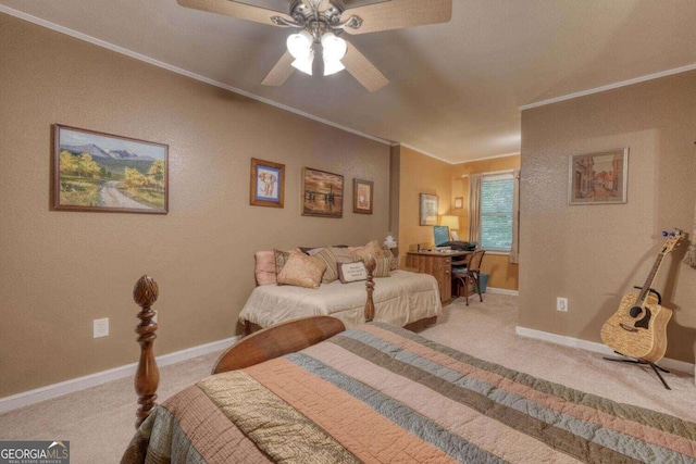 bedroom featuring ornamental molding, light colored carpet, and ceiling fan