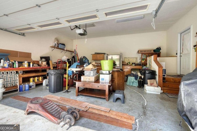 garage featuring a garage door opener