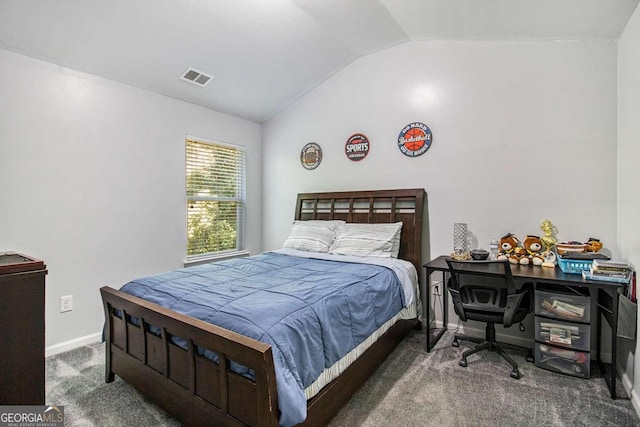 carpeted bedroom featuring vaulted ceiling