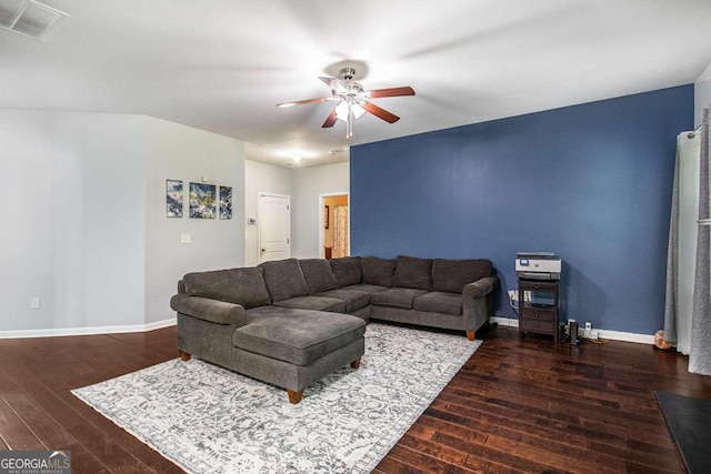 living room featuring wood-type flooring and ceiling fan