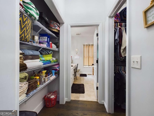 interior space with dark hardwood / wood-style flooring