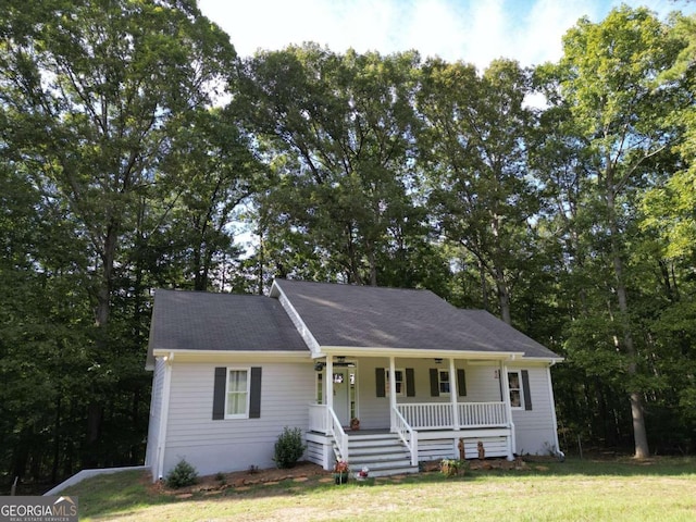 view of front of house featuring a front lawn and a porch