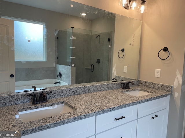 bathroom with vanity and plus walk in shower