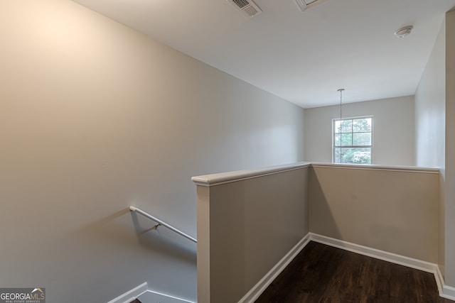 interior space with dark hardwood / wood-style flooring