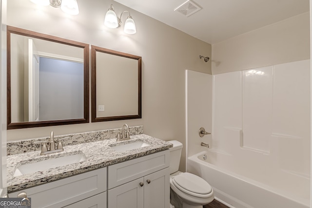 full bathroom with vanity, toilet, and tub / shower combination