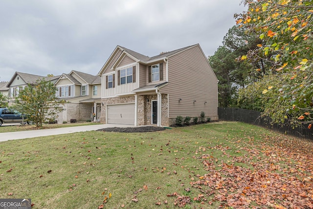 view of front of home featuring a front lawn and a garage