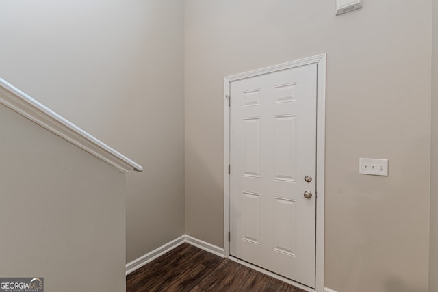 entryway featuring dark wood-type flooring