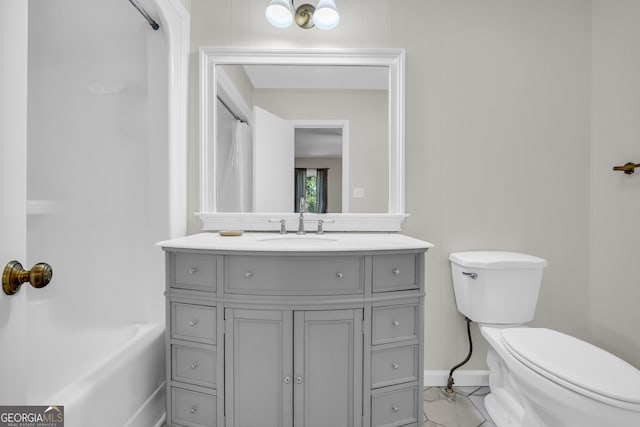 bathroom with toilet and vanity