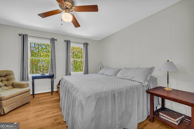 bedroom featuring light wood-type flooring and ceiling fan