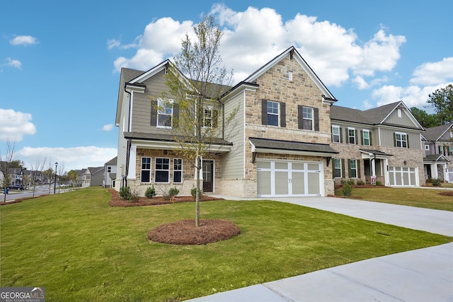 craftsman-style home with a front lawn and a garage