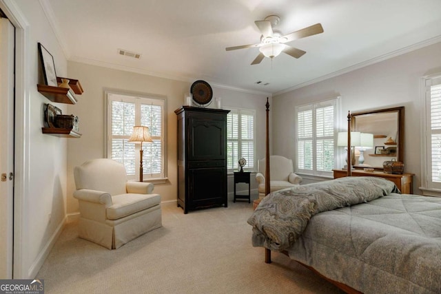 bedroom with multiple windows, ceiling fan, and crown molding