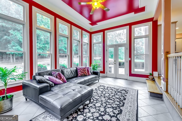 sunroom featuring a wealth of natural light and ceiling fan