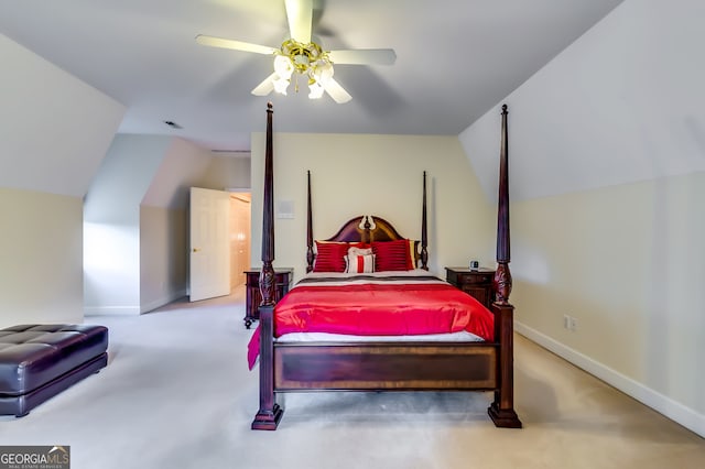 bedroom featuring light carpet, ceiling fan, and vaulted ceiling