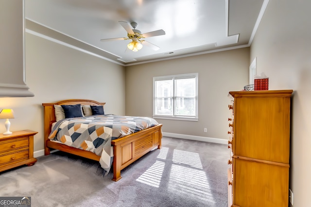 bedroom featuring crown molding, ceiling fan, and carpet