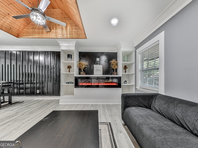 living room featuring ceiling fan, light wood-type flooring, wood ceiling, and crown molding