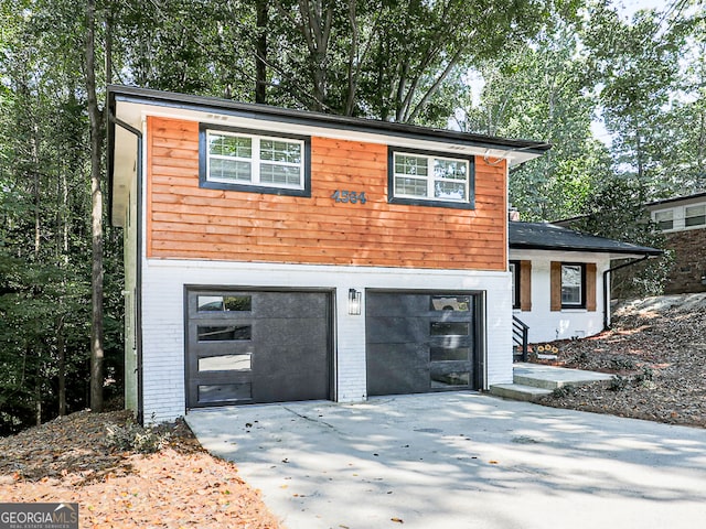 view of front of property featuring a garage