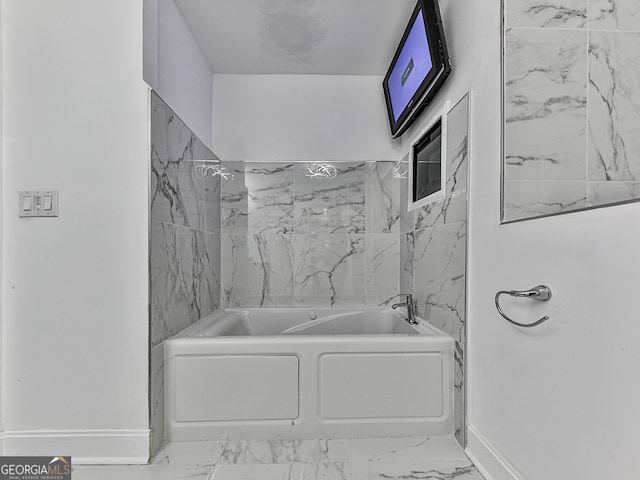 bathroom featuring a tub to relax in