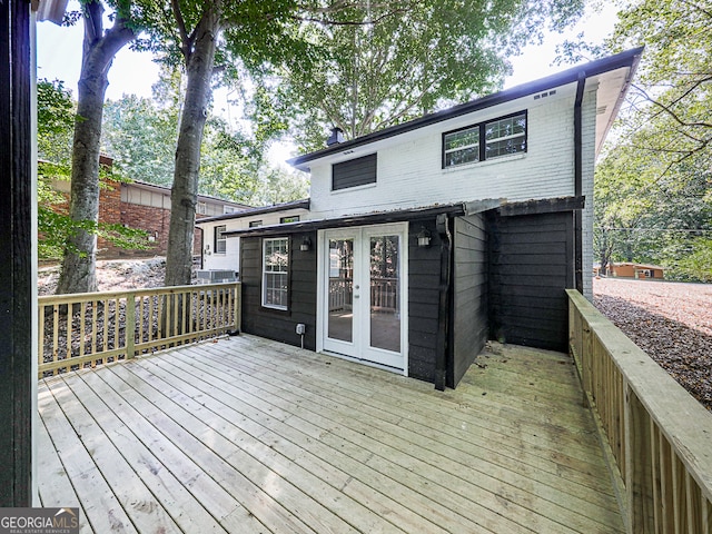 wooden deck featuring french doors