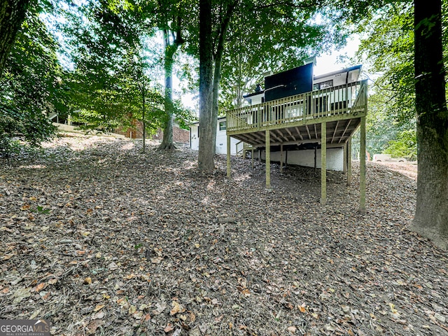 view of yard with a deck