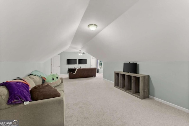 bedroom featuring carpet and vaulted ceiling