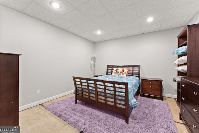 bedroom featuring a paneled ceiling