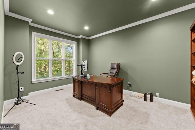 office space with light colored carpet and crown molding