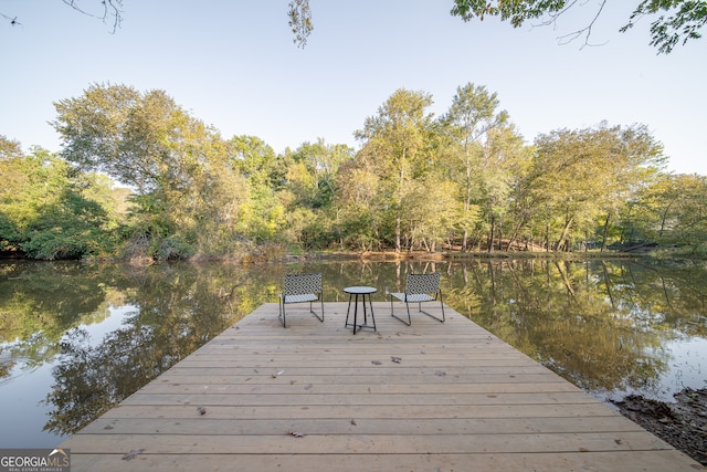 view of dock with a water view