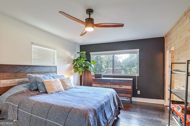 bedroom featuring dark hardwood / wood-style floors and ceiling fan