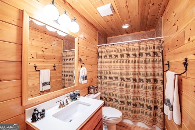 bathroom featuring vanity, wooden ceiling, wooden walls, toilet, and walk in shower