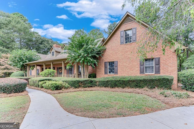 view of front of home with a front lawn