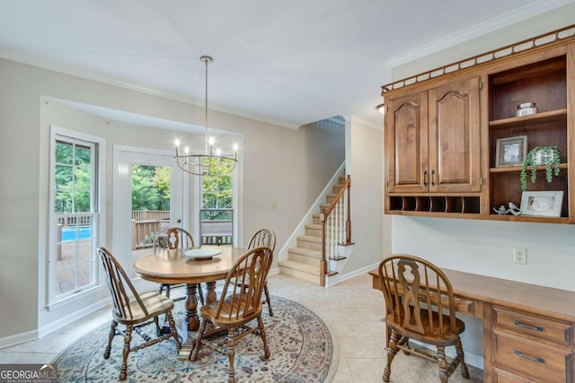 dining area with light tile patterned floors, an inviting chandelier, and ornamental molding