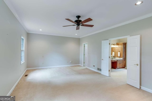 unfurnished room featuring ornamental molding, light colored carpet, and ceiling fan