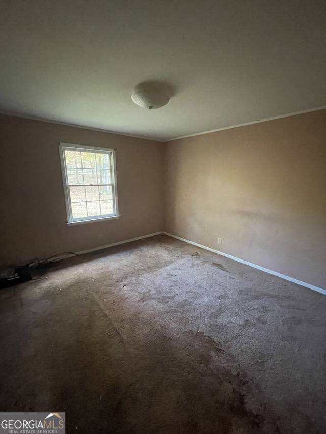 empty room with carpet floors