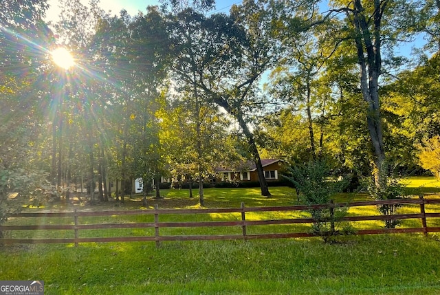 view of community featuring a yard