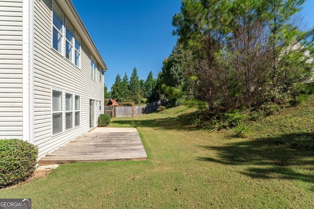 view of yard featuring a wooden deck