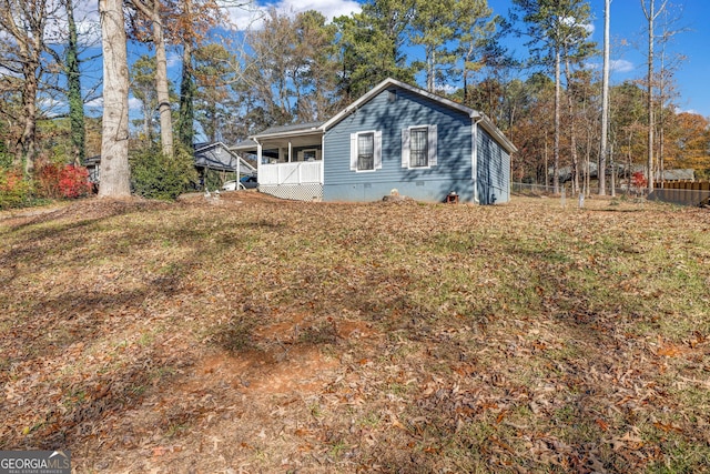 view of home's exterior with a porch