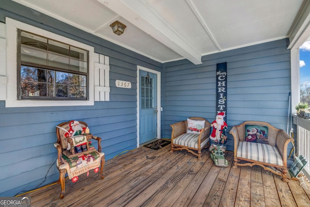 wooden deck with a porch