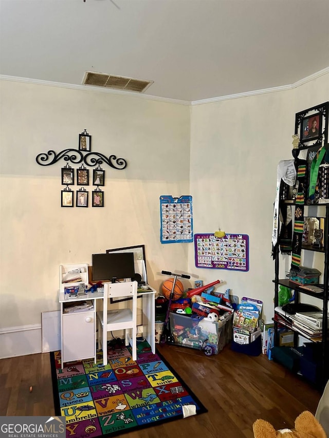 home office featuring crown molding and dark wood-type flooring