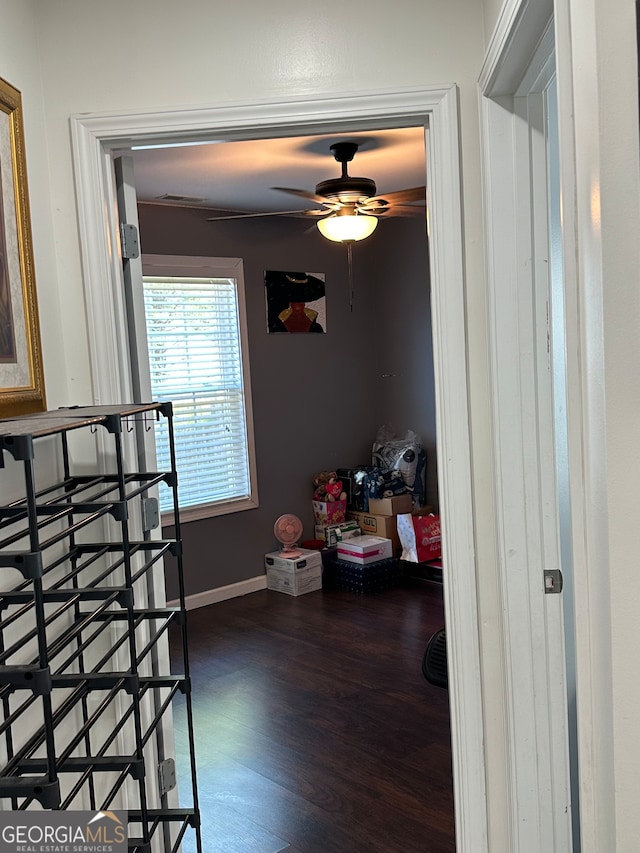 bedroom featuring crown molding and dark hardwood / wood-style floors