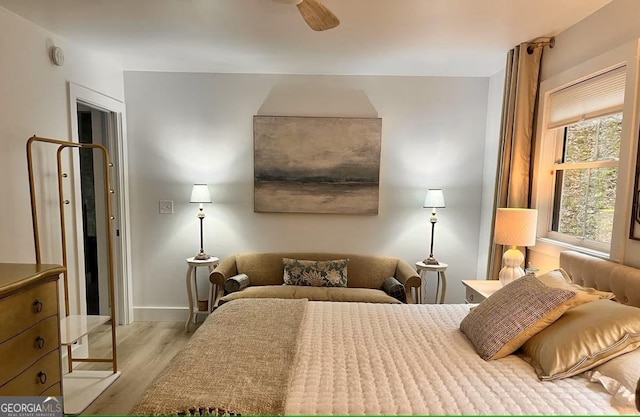 bedroom with light wood-type flooring