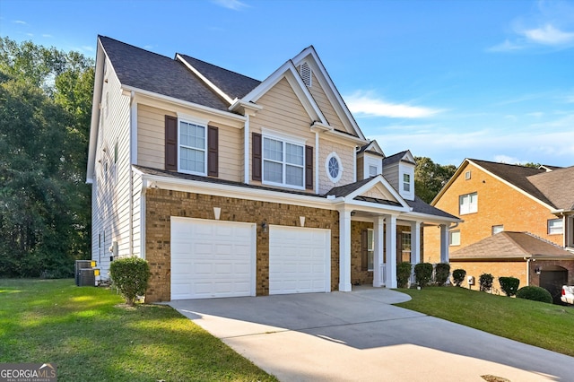 craftsman-style home with a garage and a front yard