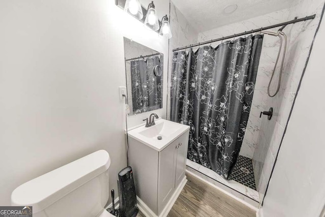 83 Sunset Ln, Newnan, GA 30263 - full bath with a shower stall, vanity, toilet, and wood finished floors