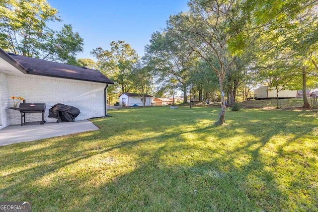 83 Sunset Ln, Newnan, GA 30263 - view of yard with an outbuilding, fence, a patio, and a shed
