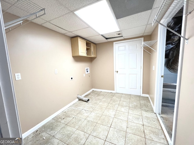 washroom featuring cabinets, hookup for an electric dryer, tile patterned flooring, and hookup for a washing machine