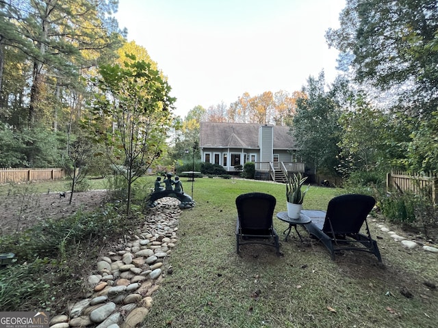 view of yard featuring a deck